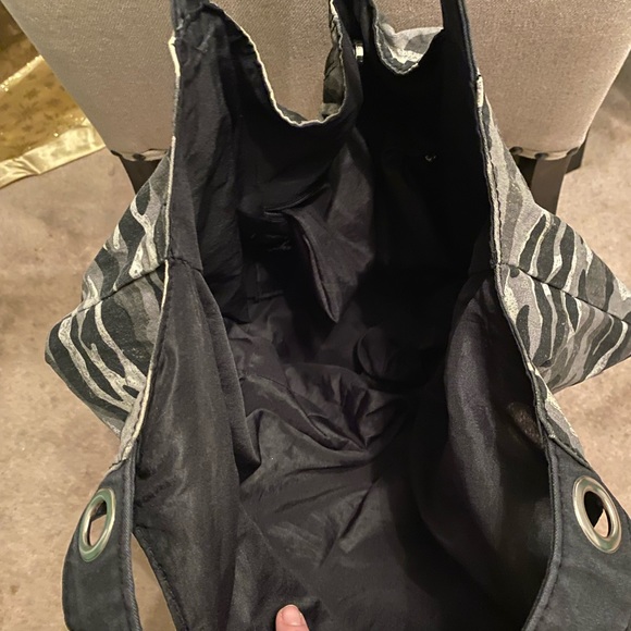 Black/gray camo print hobo style bag. Canvas material, snap closure. GUC - Picture 4 of 7